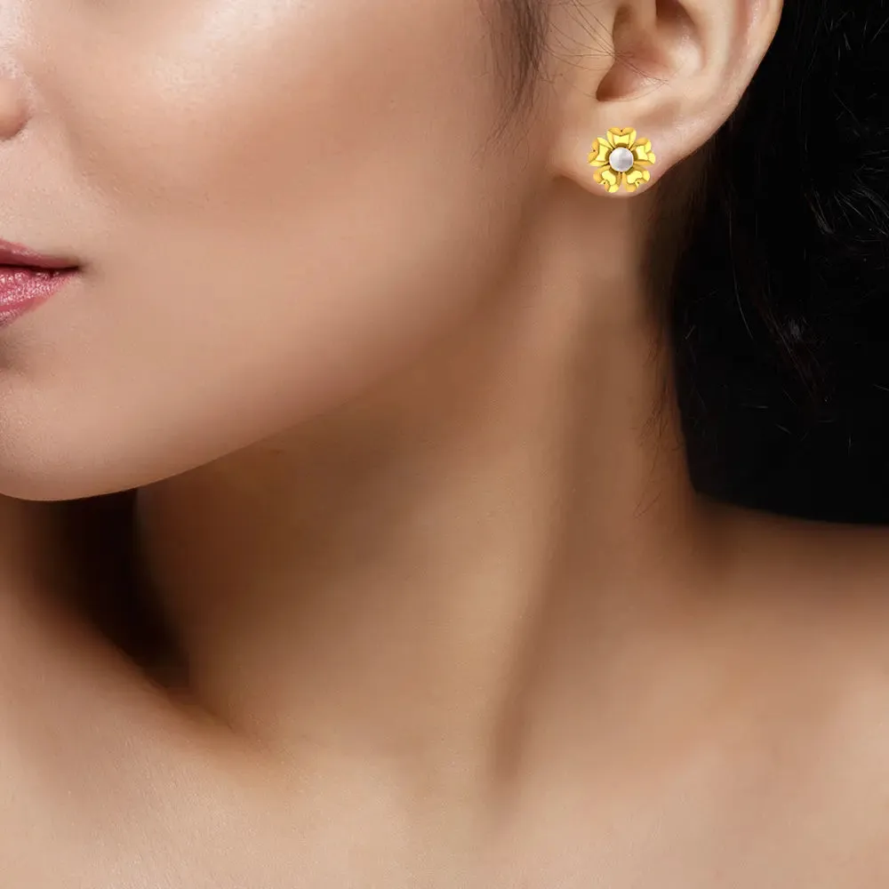 14k Gold Earring With A Floral Design And A Pearl Centre