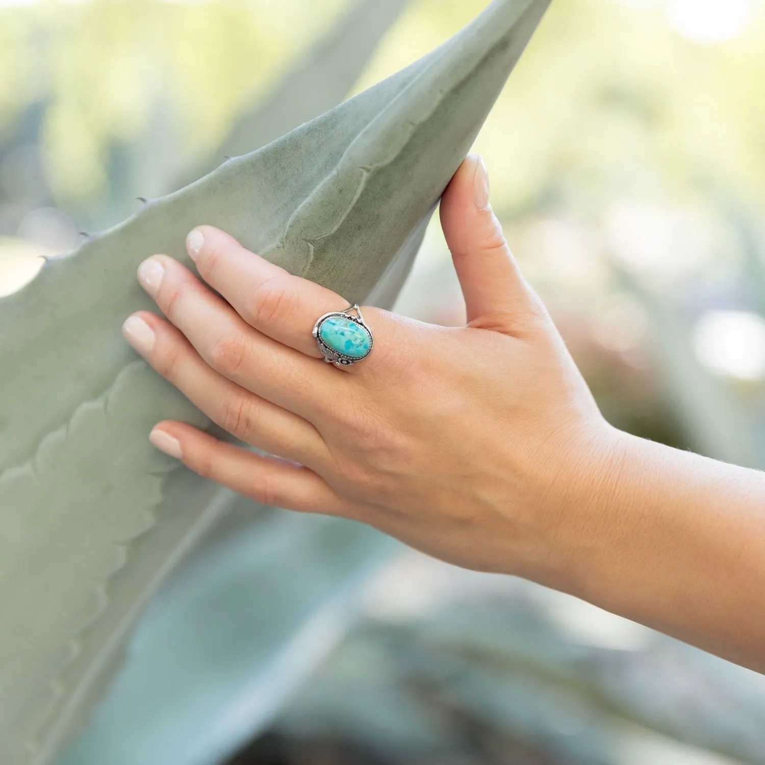 Sterling Silver Oval Turquoise Floral Design Ring