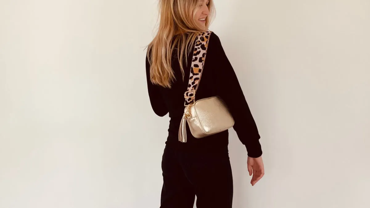 The Tassel Gold Leather Crossbody Bag With Navy Leopard Strap