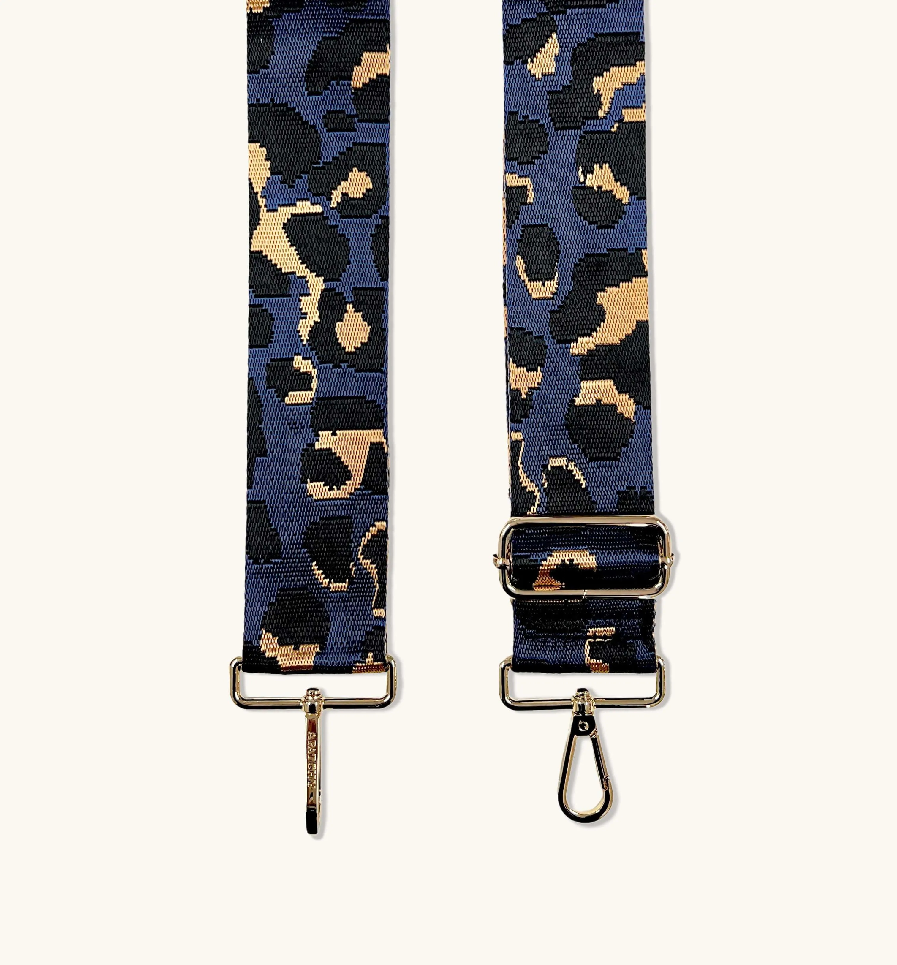 The Tassel Gold Leather Crossbody Bag With Navy Leopard Strap