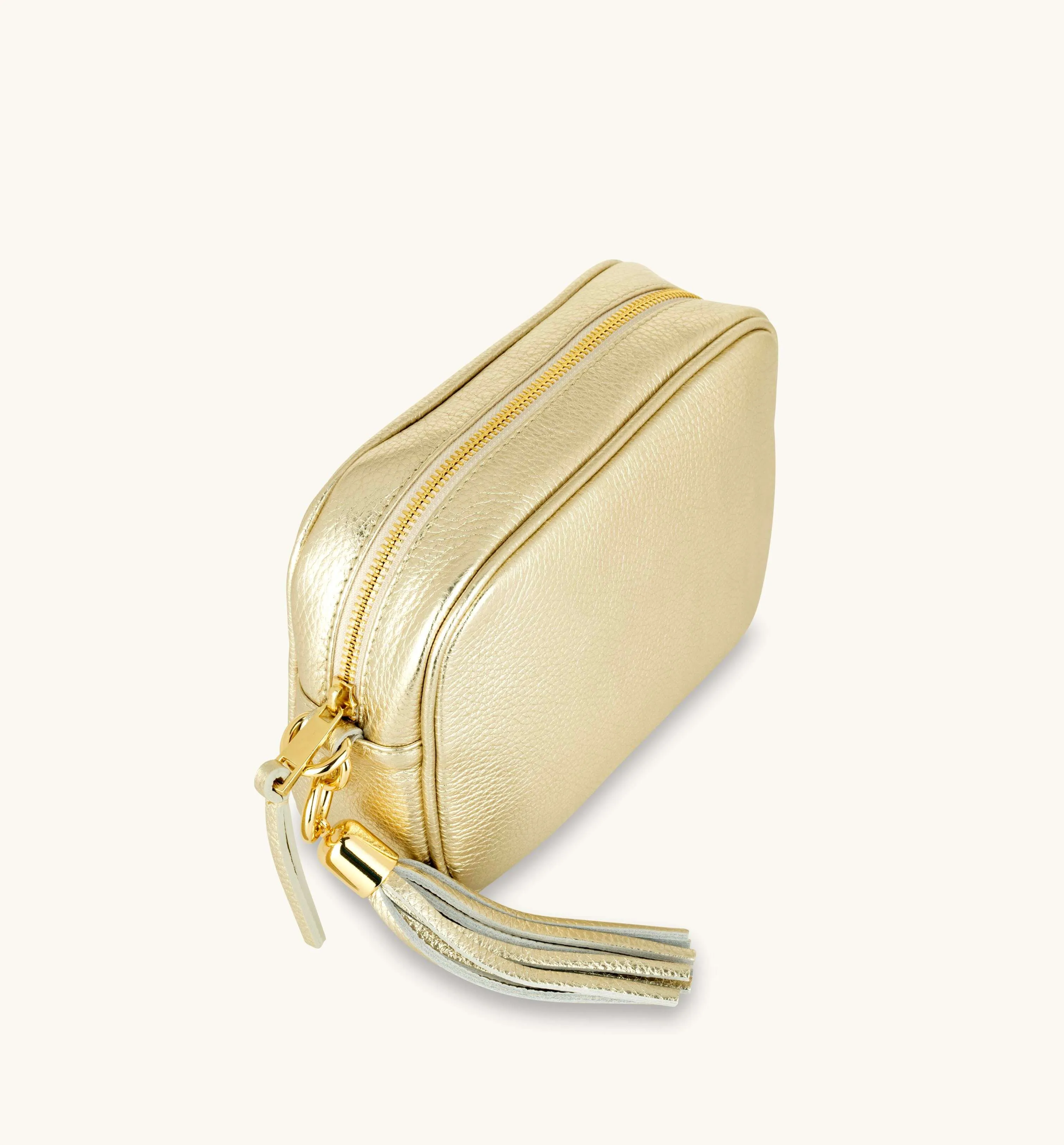 The Tassel Gold Leather Crossbody Bag With Navy Leopard Strap